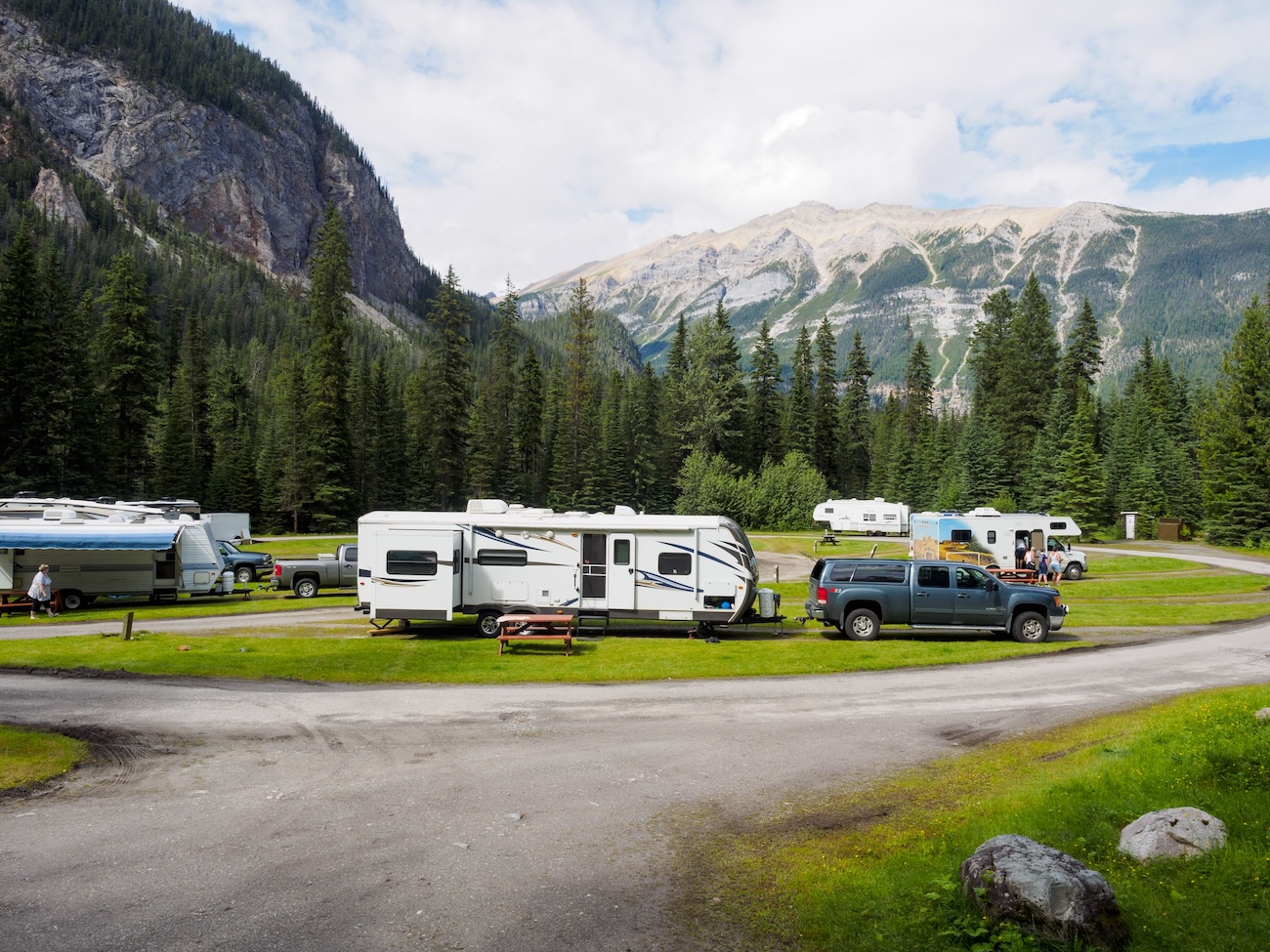 Spacious RV site at Parry Sound KOA Holiday with water and electric hookups