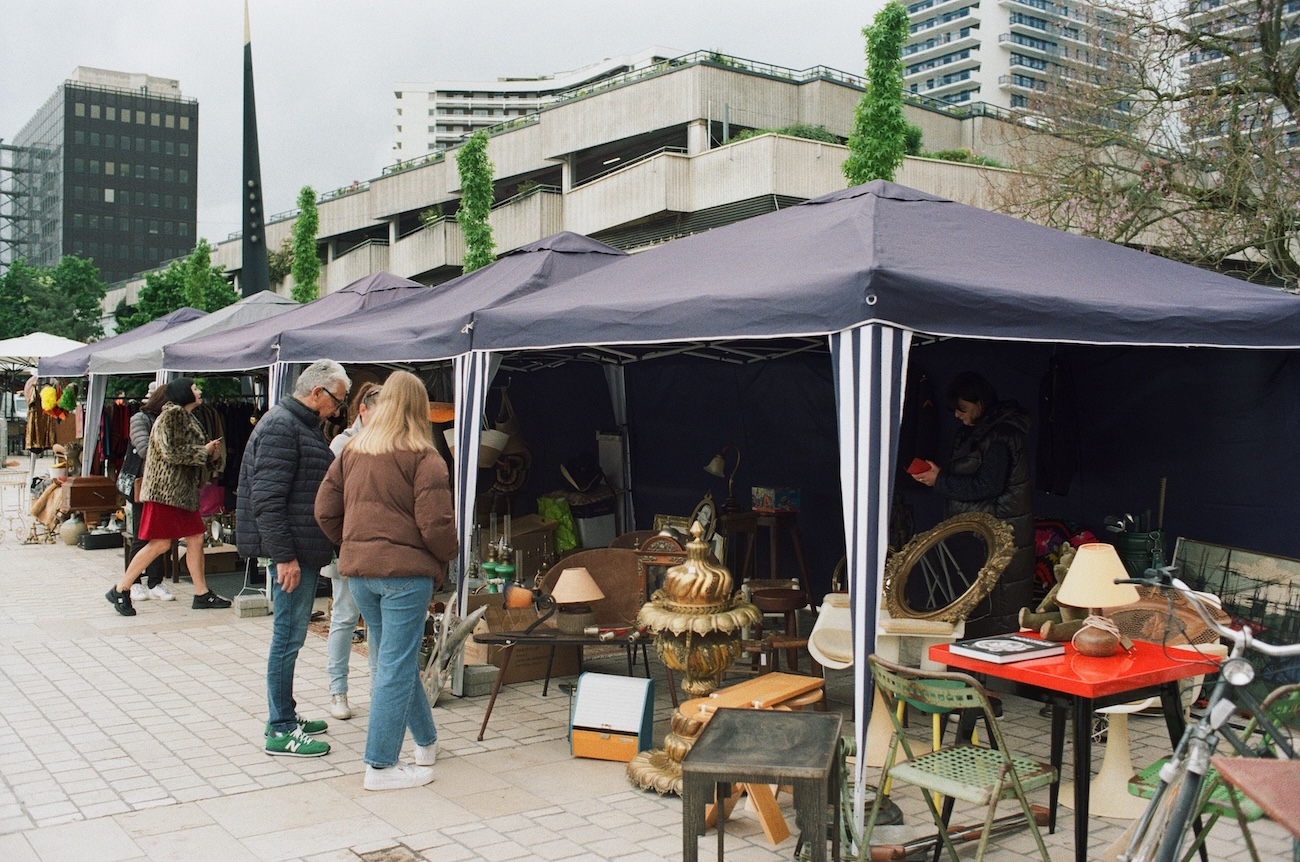 Classic outdoor flea market scene in Ontario with antiques and vintage goods